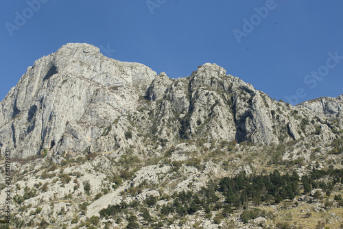  Mountain ranges in sunlight in November in the city of Kotor Montenegro. High quality photo
