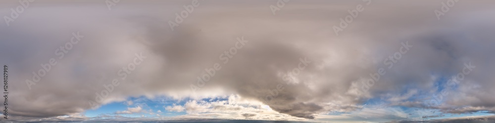 Fototapeta premium 360 Degree Panorama Showing a Cloudy Sky Over a Scenic Landscape