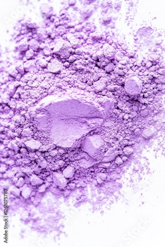 A close-up shot of a pile of purple powder on a white surface, great for beauty or scientific uses