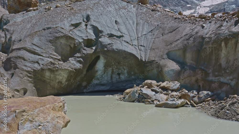 Lake next to the glacier in the Swiss Alps. Stein Glacier, Steingletscher, Urner Alps, Susten Pass, Canton of Berne, Switzerland. Lake next to the glacier in the Swiss Alps. Stein Glacier, Steingletscher, Urner Alps, Susten Pass, Canton of Berne, Switzerland.