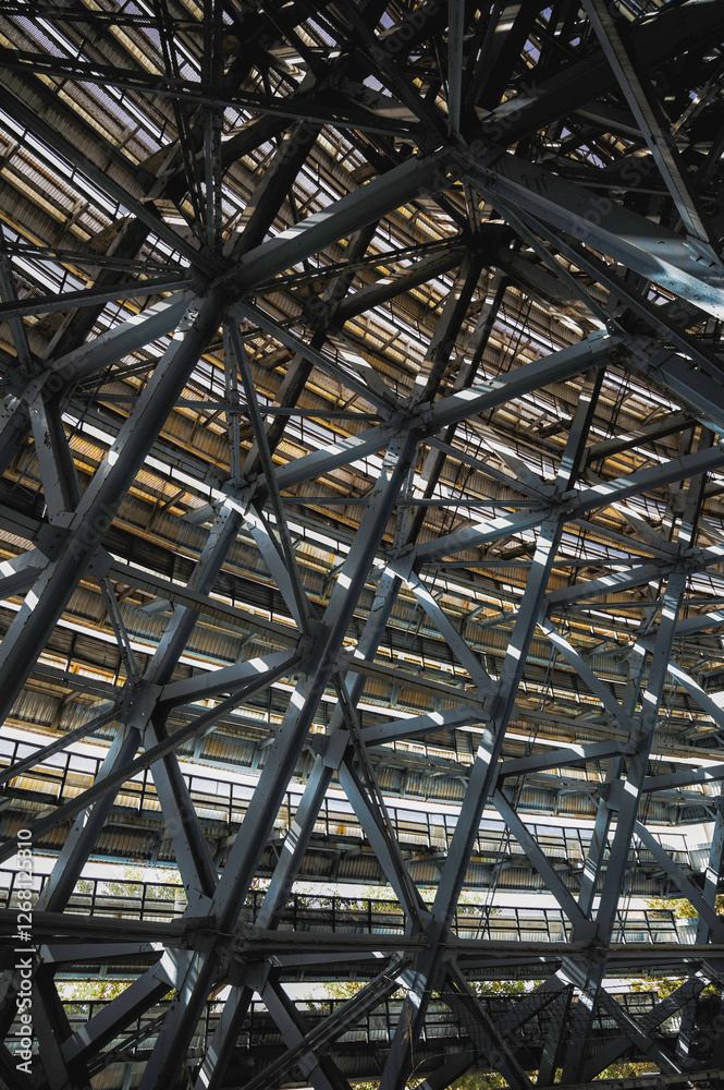A giant construction of a huge sun reflector fully made of metal structures, trusses, and joints A giant construction of a huge sun reflector fully made of metal structures, trusses, and joints