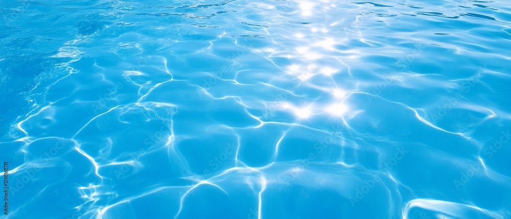 Obraz premium Swimming Pool Water Surface Sunlight Reflections