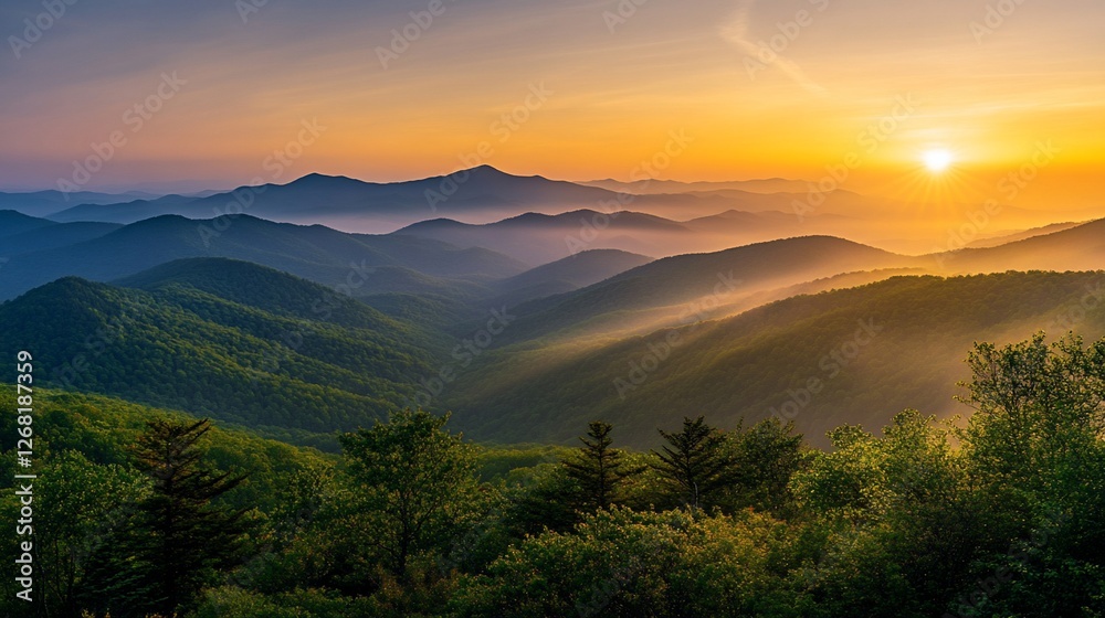Majestic sunrise over rolling green mountains and valleys, misty fog blankets the landscape. Majestic sunrise over rolling green mountains and valleys, misty fog blankets the landscape.
