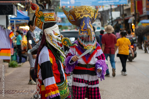 Loei, Thailand - July 6 2024  Phi Ta Khon festival Ghost mask and colorful costume Fun Traditional Tradition Very famous There are tourists around the world at Dan Sai Loei halloween of Thailand photo