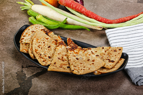 Indian Aloo Paratha - bread with potato photo