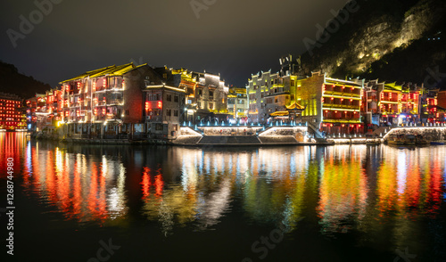 Night view of Zhenyuan Ancient Town, Guizhou, China photo