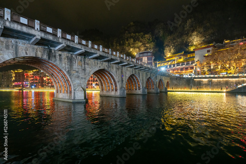 Night view of Zhenyuan Ancient Town, Guizhou, China photo