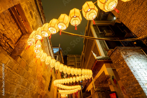 The alleys are filled with golden lanterns during the Spring Festival