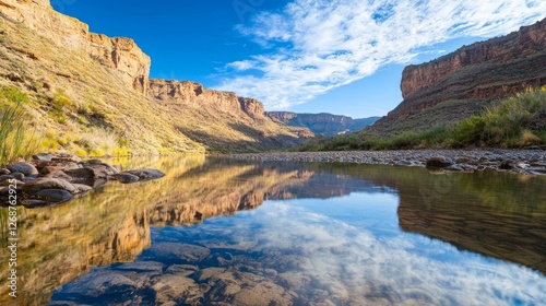 Serene Mountain Stream Landscape with Reflections in Calm Water