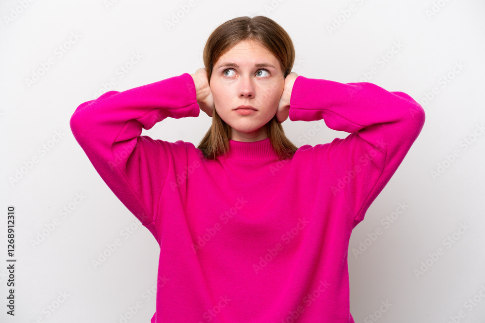 Young English woman isolated on white background frustrated and covering ears Young English woman isolated on white background frustrated and covering ears