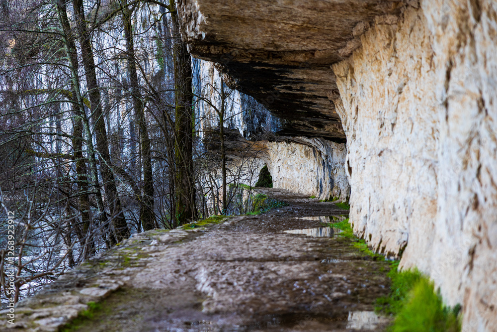 Towpath of Ganil, carved into the rock along the Lot River, in Bouziès Towpath of Ganil, carved into the rock along the Lot River, in Bouziès