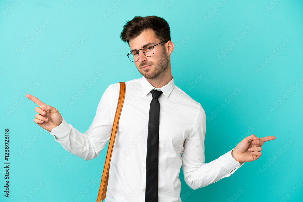 Business man over isolated background pointing finger to the laterals and happy Business man over isolated background pointing finger to the laterals and happy