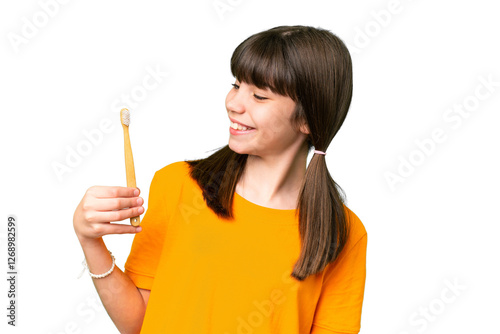 Wallpaper Mural Little caucasian girl brushing teeth over isolated background with happy expression Torontodigital.ca