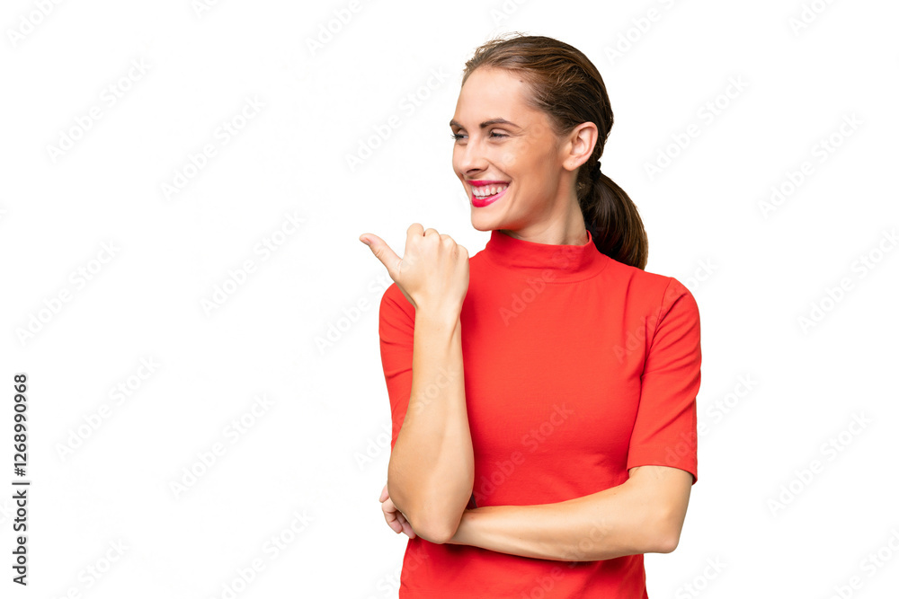 Young caucasian woman over isolated background pointing to the side to present a product Young caucasian woman over isolated background pointing to the side to present a product