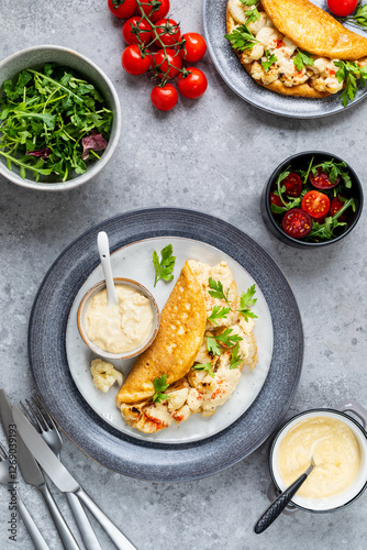 Baked cauliflower with omelet and cheese souffle