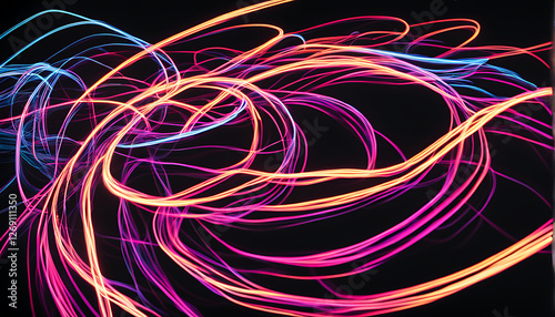 twisting neon light trails in the dark