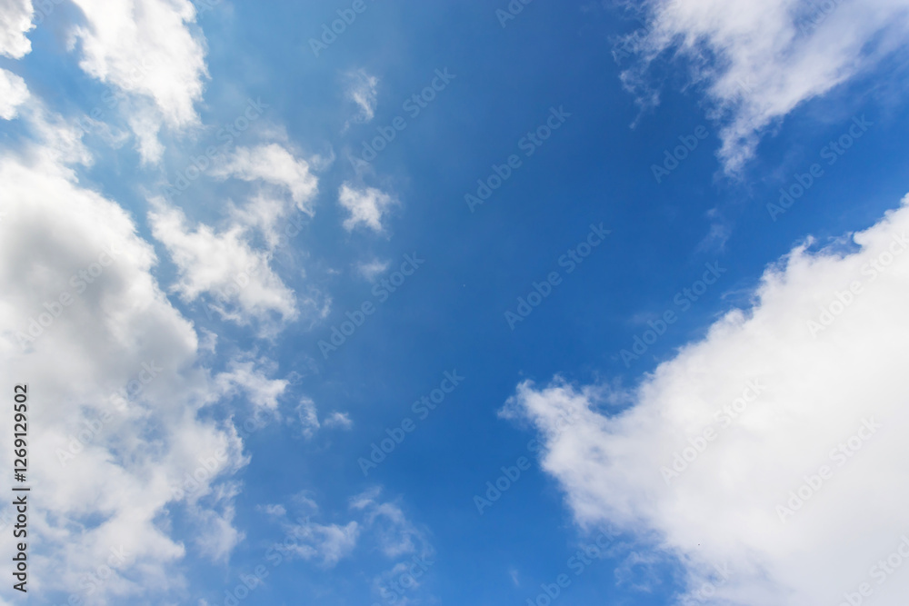 Obraz premium Blue sky background with white clouds