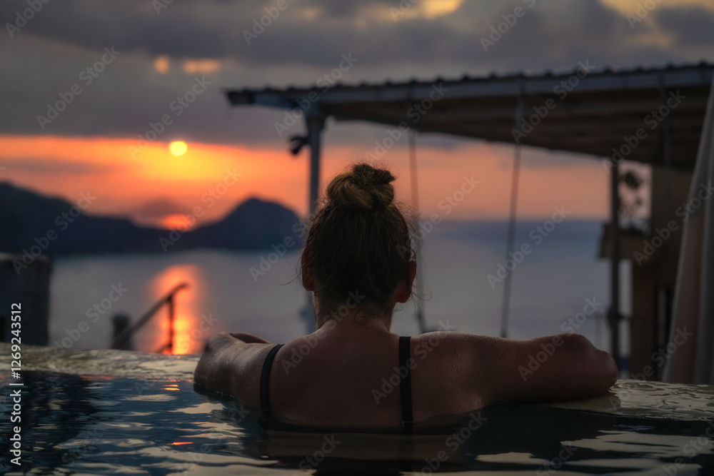 Imagine a serene sunset view from an exquisite infinity pool, a perfect escape for relaxation and tranquility amidst the breathtaking beauty of nature, Komodo, Indonesia