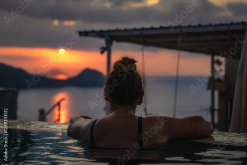 Imagine a serene sunset view from an exquisite infinity pool, a perfect escape for relaxation and tranquility amidst the breathtaking beauty of nature, Komodo, Indonesia photo