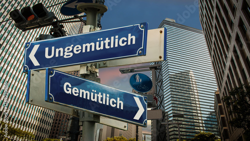 Foto Signposts the direct way to Cozy versus Uncomfortable
