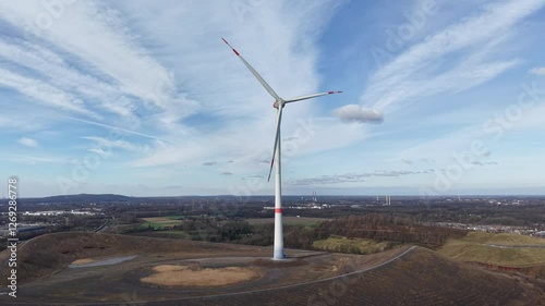 Windrad an einem klaren Wintermorgen auf einer Halde im Ruhrgebiet photo