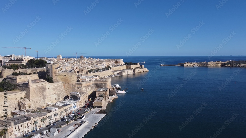Valletta waterfront, Malta, aerial view. Valetta on the left and three cities on the right. High quality photo Valletta waterfront, Malta, aerial view. Valetta on the left and three cities on the right. High quality photo