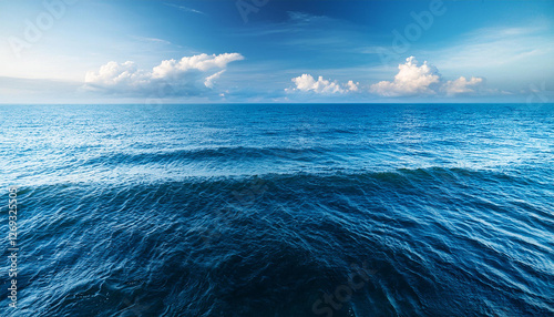 blue sea surface with to the horizon sea waves with cloudy sky abstract background of water flow in ocean sea river lake seascape wallpaper photo