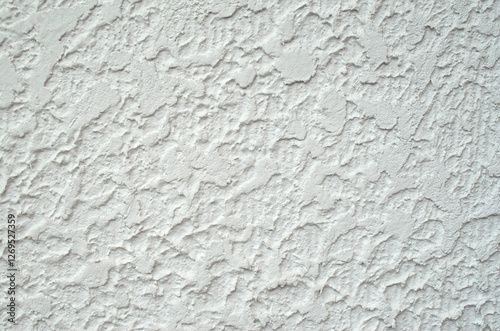 White rough plaster on wall closeup