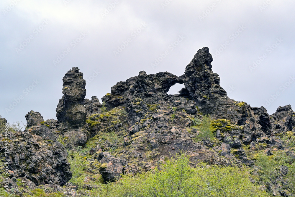 Lava formation in a nature reserve which is a tourist attraction in Dimmuborgir, Iceland. No people. Lava formation in a nature reserve which is a tourist attraction in Dimmuborgir, Iceland. No people.
