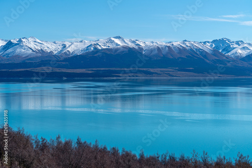 Scenic view of lake pukaki on the way to mount cook new zealand photo