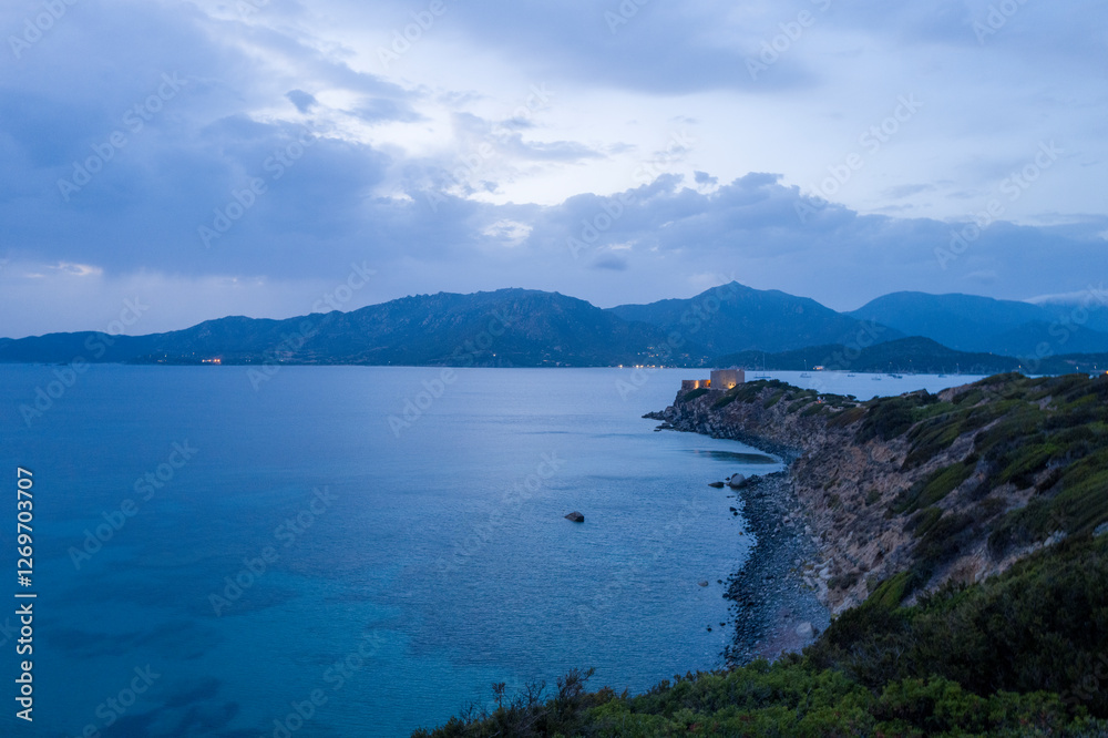 Capo Carbonara at night in Cala Caterina in Europe, Italy, Sardinia, Cala Caterina, in summer, on a sunny day. Capo Carbonara at night in Cala Caterina in Europe, Italy, Sardinia, Cala Caterina, in summer, on a sunny day.