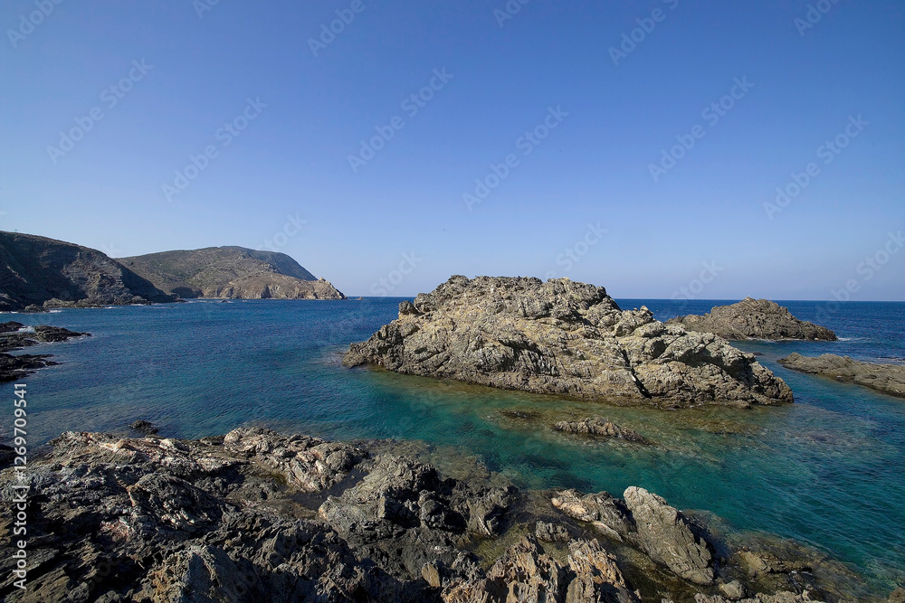 Fototapeta premium coast of the mediterranean sea, Shale cliffs at Narrows. Asinara National Park. Sassari. Sardinia. Italy. Asinara National Park