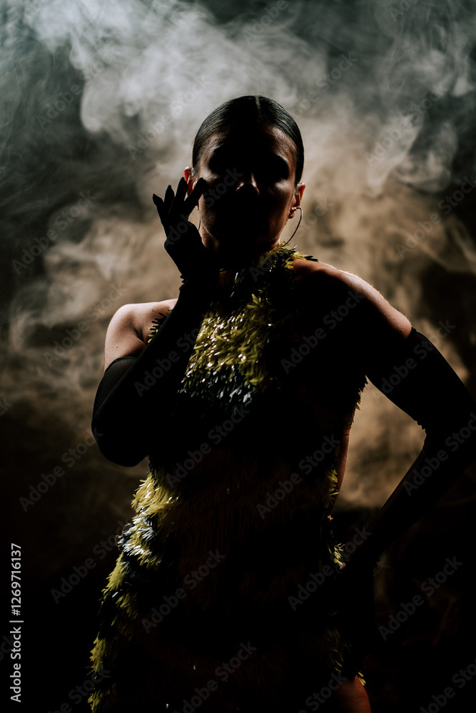Latina woman dances passionately in the dark with smoke surrounding her, showcasing elegant movements of various dance styles Latina woman dances passionately in the dark with smoke surrounding her, showcasing elegant movements of various dance styles