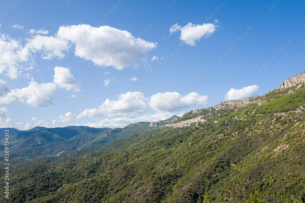 Obraz premium The countryside around the town of Baunei in Europe, Italy, Sardinia, Baunei, in summer, on a sunny day.