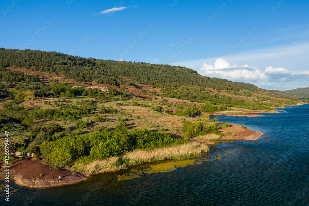 Fototapeta premium Lake Salagou in Europe, France, Occitanie, Herault, Clermont l Herault, in summer, on a sunny day.