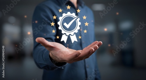 A person holds out a hand displaying a digital badge symbolizing quality and excellence, surrounded by stars, in a professional setting.