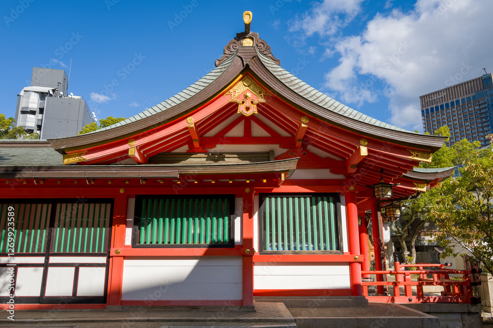 Fototapeta premium Ikuta Jinja Shrine in Kobe in Asia, Japan, Kansai, Kobe, in summer, on a sunny day.