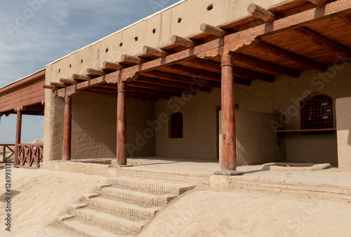 old building. islamic state. arabic architecture. Low-Angle View of a Beige Islamic Architectural Building in a Middle Eastern Country