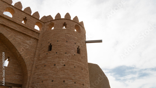 old building. islamic state. arabic architecture. Low-Angle View of a Beige Islamic Architectural Building in a Middle Eastern Country