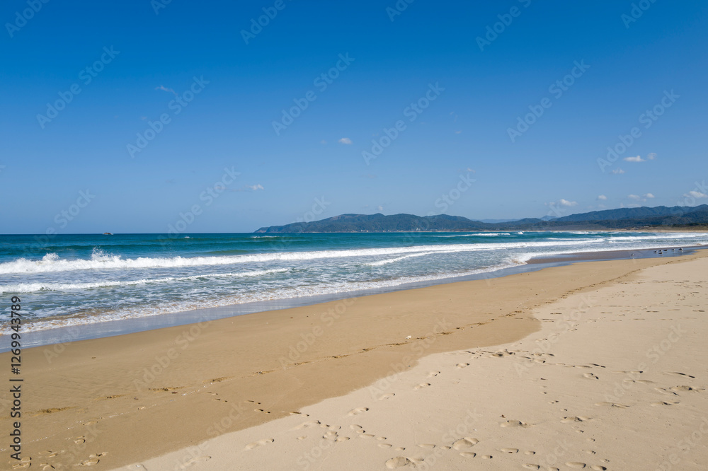 Shotenkyo Beach in Kumihamacho in Asia, Japan, Kansai, Kinosaki, in summer on a sunny day. Shotenkyo Beach in Kumihamacho in Asia, Japan, Kansai, Kinosaki, in summer on a sunny day.