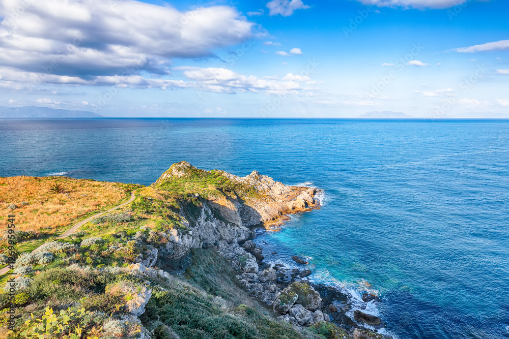 Fototapeta premium Scenic spring view on the the cape Milazzo panorama of nature reserve Piscina di Venere.