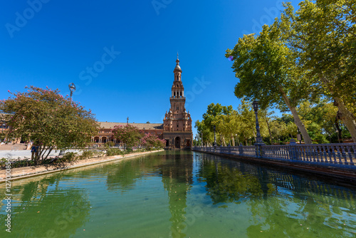 Obraz na płótnie Sevilla, Spain - August 01, 2024: Plaza de Espana in Seville, Andalusia. The Plaza de Espana, built in 1928, is a plaza in the Parque de Maria Luisa in Seville, Spain. w salonie