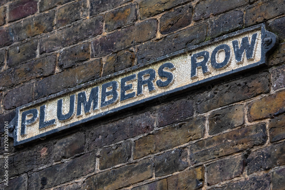 Obraz premium Street Sign for Plumbers Row in Tower Hamlets, London