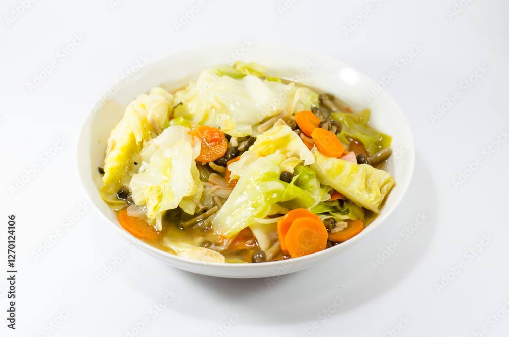 mixed vegetables and eryngii mushroom in oyster sauce in a white bowl on a white background mixed vegetables and eryngii mushroom in oyster sauce in a white bowl on a white background