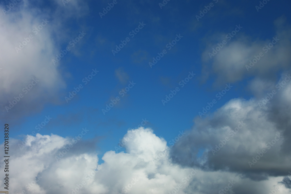 Blue sky with white fluffy clouds Blue sky with white fluffy clouds