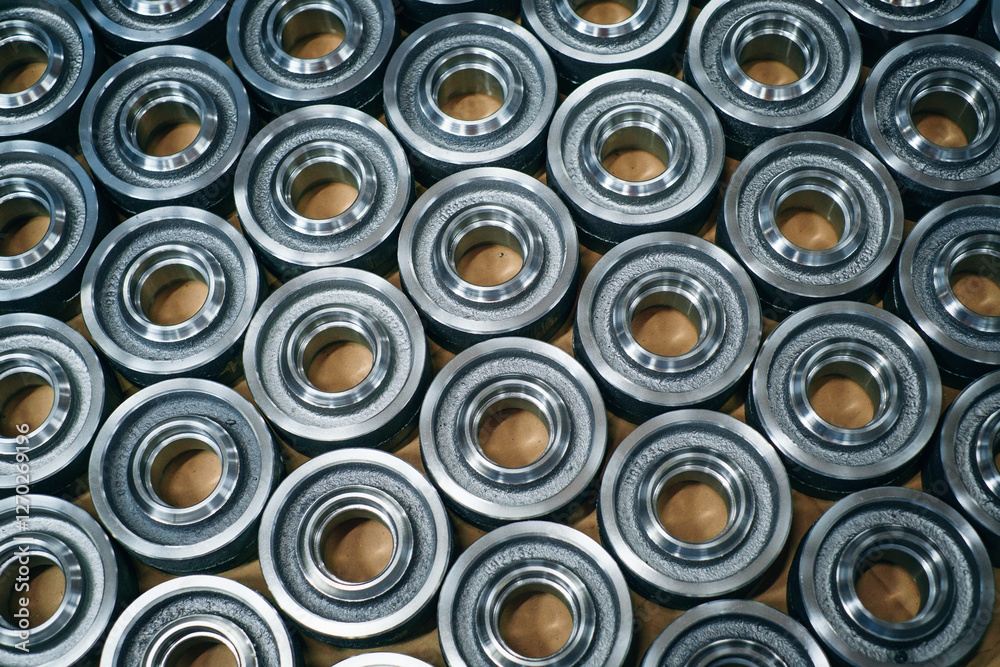 Circular Metal Parts: Close up of machined components arranged closely together Circular Metal Parts: Close up of machined components arranged closely together