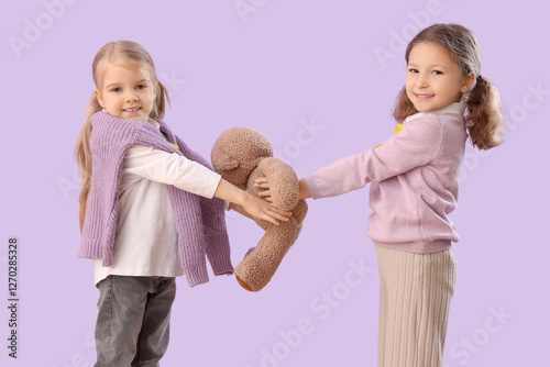 Cute little girls with tedd...