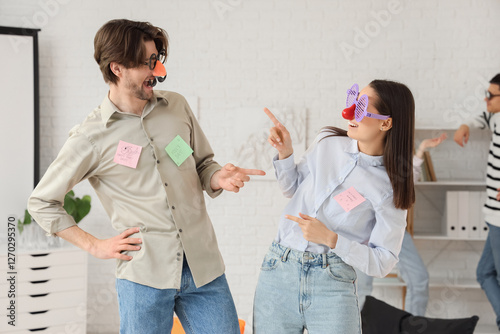 Happy young colleagues wear...