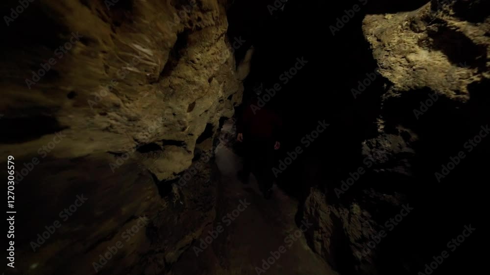 Exploring intriguing underground caves in dim lighting and unique landscapes Exploring intriguing underground caves in dim lighting and unique landscapes