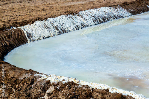 Asia, South Asia, India. Great Rann of Kutch, salt marsh in Thar Desert. One of the largest salt deserts in the world. Harvesting salt. photo